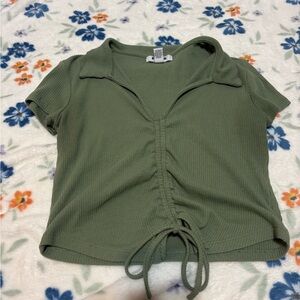 Green cropped middle cinch collared t-shirt